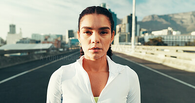 Buy stock photo Serious, sports and portrait of woman in city for running, workout or training for marathon. Confident, fitness and face of female athlete from Brazil with cardio exercise on bridge in urban town.