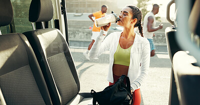 Buy stock photo Runner, drinking and smoothie with woman in city for workout, protein shake and training. Health, energy and fitness nutrition with person and car for marathon exercise, sports and running athlete