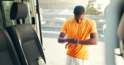 Buy stock photo Fitness, athlete and man with smart watch, check or workout tracking with tech, website and vehicle. Monitor, app and black person with sportswear for exercise, transport and tracker for heart rate