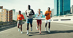 Fitness, group and people running in city with workout, health or training for marathon. Sports, friends and athletes with cardio exercise for race practice, wellness or teamwork in urban town.