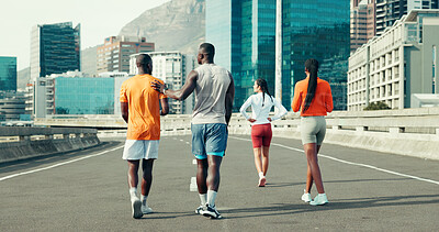 Buy stock photo Back, friends and fitness with people in city for marathon, workout and training performance. Sports athlete, exercise and cardio with group of runner in street for challenge, running and wellness