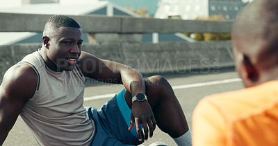 Buy stock photo Friends, fitness and people with rest in road for running break, conversation or exercise recovery. Athlete, black men and talking on city bridge with burnout, marathon discussion or training fatigue