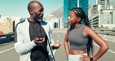 Buy stock photo Fitness, runner and instructor with stopwatch outdoor for running time, progress fail and advice. Bridge, black people and personal trainer with concern for bad performance, workout pace and training