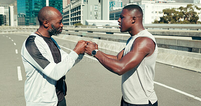 Buy stock photo Fist bump, fitness and teamwork with friends in city for support, running club and motivation. Sports challenge, exercise and connection with black men outdoor for wellness, training and marathon