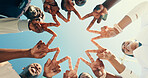 Below, fitness and friends with peace sign with blue sky for exercise, community and workout. Sports, teamwork hands of people for support, motivation and goals for wellness, endurance or challenge