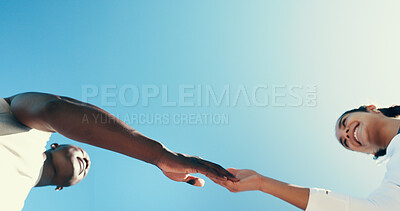 Buy stock photo Handshake, running and teamwork with friends in city for support, fitness club and motivation. Sports space, exercise and connection with low angle of people for wellness, training and mockup