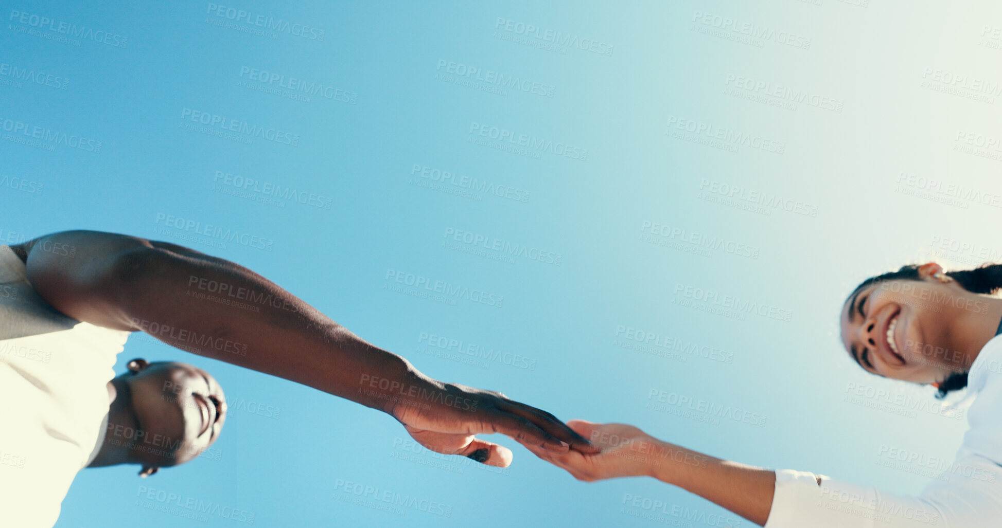 Buy stock photo Handshake, running and teamwork with friends in city for support, fitness club and motivation. Sports space, exercise and connection with low angle of people for wellness, training and mockup