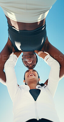 Buy stock photo Huddle, running and teamwork with friends in city for support, fitness club and motivation. Sports challenge, exercise and connection with low angle of people for wellness, training and marathon