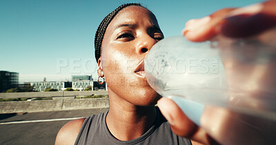Buy stock photo Runner, fitness or black woman with drinking water in city for hydration, thirst or running fatigue. POV, face of athlete and liquid bottle in road for exercise refresh, marathon recovery and break