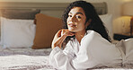 Woman, morning and portrait on bed in hotel room for luxury vacation, spa day promo or getaway trip. Hospitality, happy girl or relax with robe at accommodation for self care retreat or weekend break