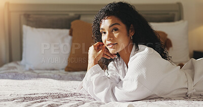 Buy stock photo Woman, spa and relax on bed in hotel room for luxury vacation, weekend break or wellness resort. Hospitality, person and portrait with robe at accommodation for self care retreat and peaceful holiday