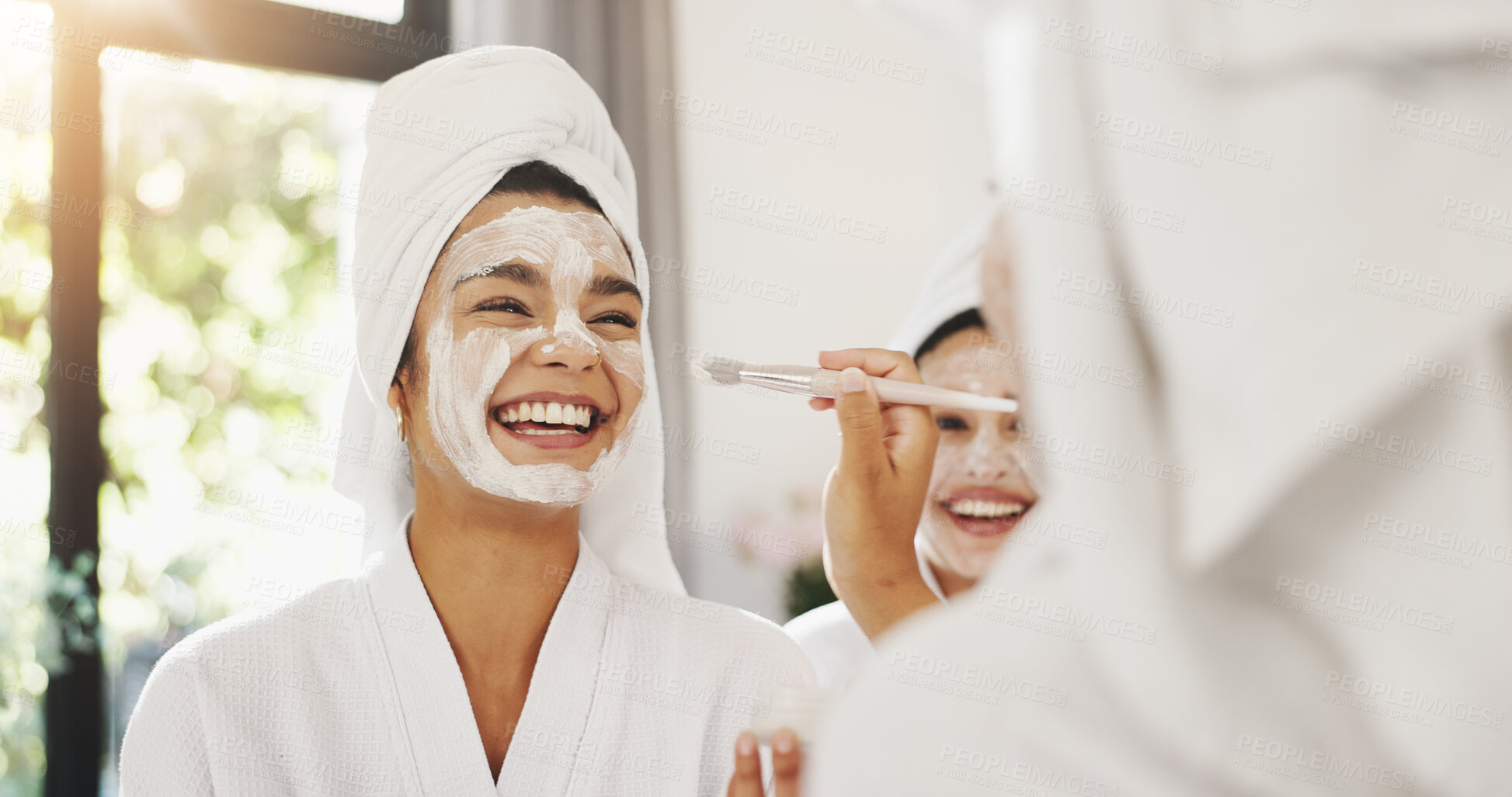 Buy stock photo Spa, mirror and face mask with friends in hotel for beauty treatment, bonding and hospitality. Skincare, facial and laughing with women in bedroom of resort for self care, DIYy pamper and travel