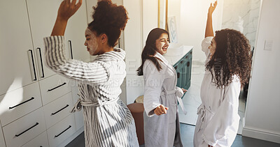 Buy stock photo Spa, dance and face mask with friends in hotel for beauty treatment, celebration and hospitality. Skincare, facial and music with women in bedroom of resort for self care, diy pamper and travel