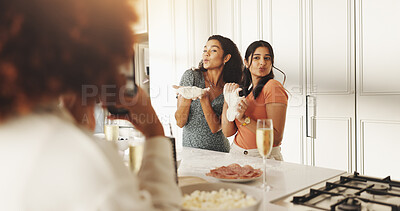 Buy stock photo Women, friends and cooking with photo, phone and happy with dough, pout and post on web in home. People, group and recipe with kiss, flour and ingredients with food on social network in kitchen