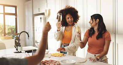 Buy stock photo Girl, friends and cooking with toast, champagne and happy with bonding, love and reunion in home. Women, wine glass and smile with celebration, ingredients and food with alcohol in kitchen at house
