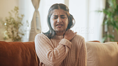Buy stock photo Woman, injury and stress for shoulder pain on sofa with inflammation, muscle tension or discomfort. Sore, person and joint ache in home with fibromyalgia, osteoporosis and uncomfortable with pressure