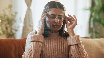 Buy stock photo Woman, pain and headache of stress on sofa for financial crisis, overwhelmed or mental health. Glasses, person or tension migraine in home for wrong prescription, overthinking or dizzy for bankruptcy