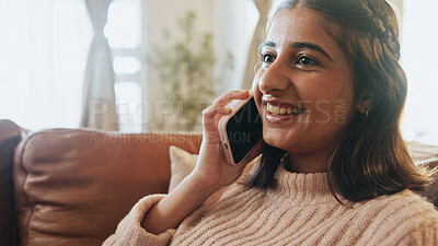 Buy stock photo Woman, phone call and happy with talk on sofa, relax or contact in lounge for conversation at house. Person, smartphone and smile in home, listen and chat on couch on in living room at apartment