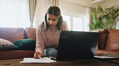 Buy stock photo Woman, finance and stress with documents in home with laptop, debt or fintech for payment on sofa. Person, paperwork and confused with review, bills or computer for credit score on couch at apartment