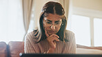 Thinking, student and woman on laptop in home for assignment, project and online assessment. College, thoughtful and person on computer for elearning, education and studying for university in house