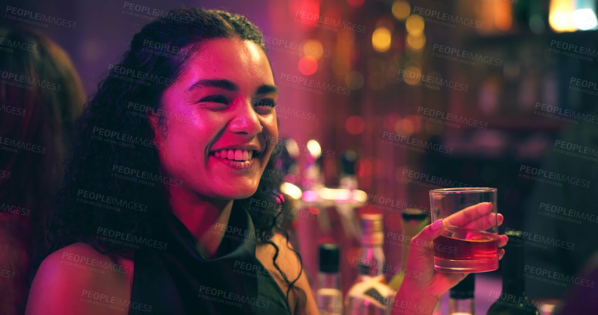 Buy stock photo Woman, smile and talk with drink at nightclub with celebration, party and social event at bar. Friends, girl and discussion with whiskey, alcohol and excited with beverage for new years eve at pub