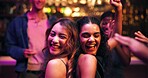 Women, dancing and happy with friends at nightclub with celebration, party and social event at bar. People, girl and smile with rhythm, culture and excited with music for new years eve at restaurant