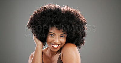 Buy stock photo Beauty, portrait and woman with afro in studio with healthy texture, growth results and volume. Haircare, african person and happy with hairstyle on gray background for self care glow and maintenance