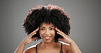 Natural, beauty and portrait of black woman in studio for hair care, healthy texture or growth. Smile, mockup space and person with afro hairstyle for wellness, grooming or glow on gray background