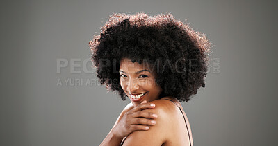 Buy stock photo Happy, beauty and portrait of black woman in studio smile for hair care, texture or growth. Health, mockup space and person with natural hairstyle for wellness, grooming or glow on gray background