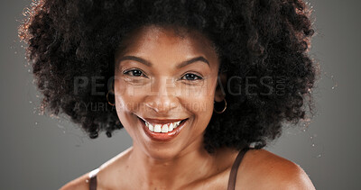 Buy stock photo Happy, beauty and portrait of black woman in studio with natural hair, wellness and cosmetics. Smile, salon and face of person with afro hairstyle for texture, growth and shine on gray background