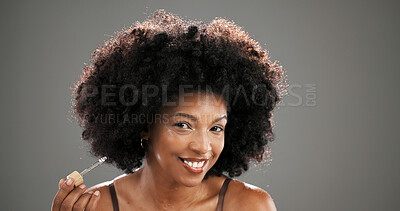 Buy stock photo Skincare, portrait and woman with serum in studio for wrinkle treatment, hydration or natural beauty. Mockup, African person and happy with cosmetics dropper for skin regeneration on gray background