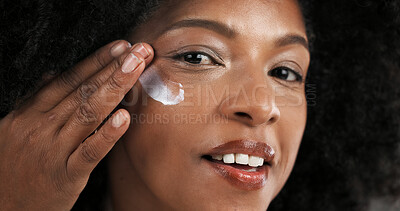 Buy stock photo Cream, beauty and portrait of black woman in studio for skincare, wellness and anti aging. Dermatology, happy and person with moisturizer, lotion and cosmetics for skin hydration, facial or treatment