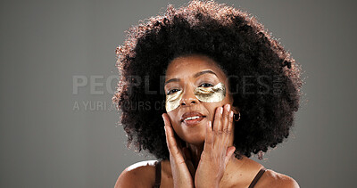 Buy stock photo Skincare, eye mask and portrait of black woman in studio for facial treatment, beauty and dark circles. Mockup, space and person with pads for anti aging, health and cosmetics on gray background