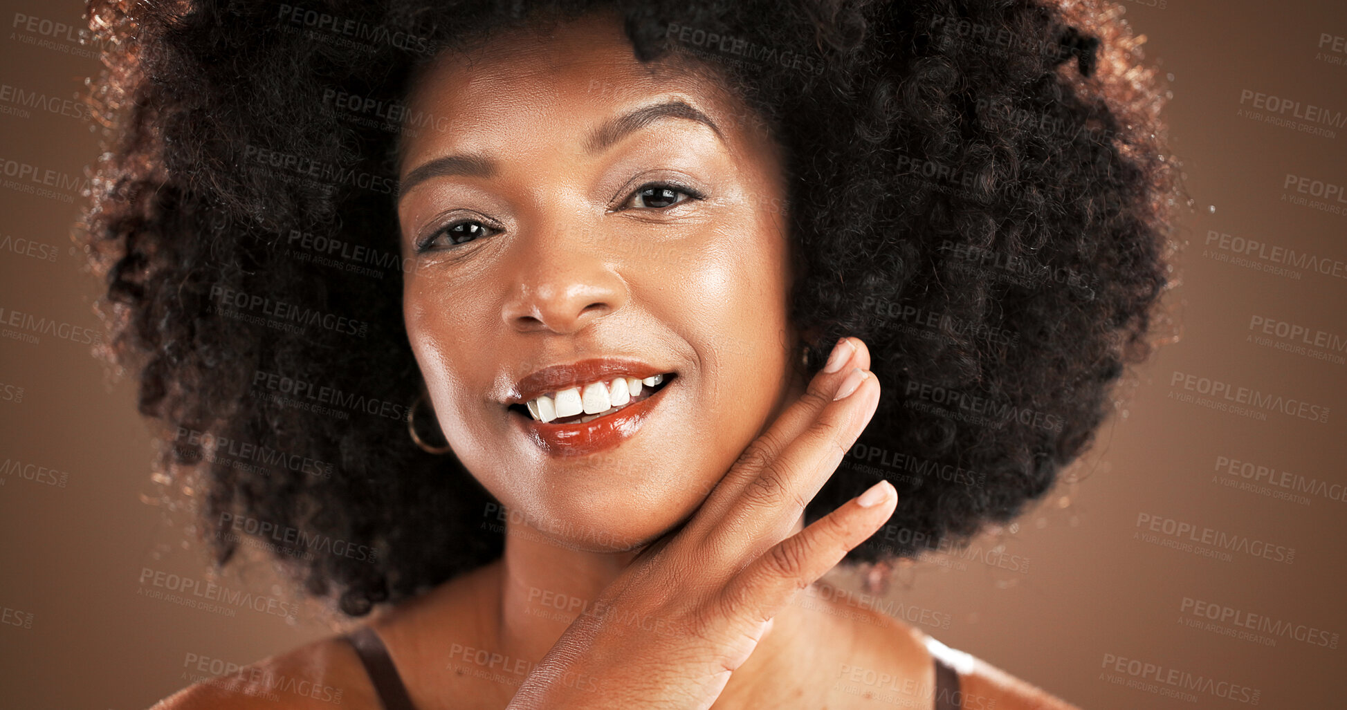 Buy stock photo Beauty, woman and portrait with skincare in studio with natural foundation, makeup glow or results. Wellness, smile or african person with healthy skin from cosmetics or self care on brown background