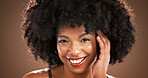 Hair care, studio and portrait of black woman for health, texture and growth on brown background. Hairdresser, mockup space and person smile with natural hairstyle, afro and grooming for wellness