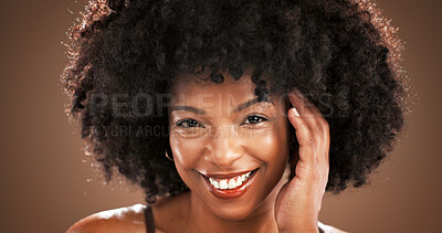 Buy stock photo Hair care, studio and portrait of black woman for health, texture and growth on brown background. Hairdresser, mockup space and person smile with natural hairstyle, afro and grooming for wellness