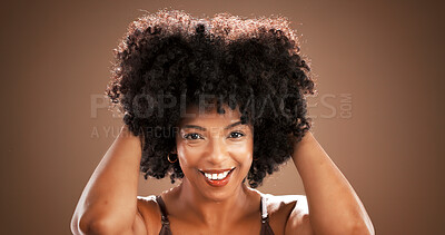 Buy stock photo Hair, happy and portrait of black woman on brown background for health, texture and growth in studio. Salon, mockup space and person with natural hairstyle, afro and beauty for wellness and grooming