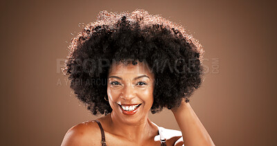 Buy stock photo Hair, smile and portrait of black woman in studio for health, texture and growth on brown background. Salon, mockup space and person with natural hairstyle, afro and beauty for wellness and grooming