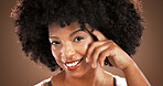 Happy, beauty and portrait of black woman in studio with natural hair, confidence and cosmetics. Dermatology, mockup and face of person for wellness, skincare glow and facial on brown background