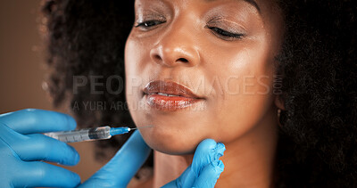Buy stock photo Plastic surgery, syringe and face of black woman in studio for beauty treatment, filler and skincare. Dermatology, brown background and person with needle for cosmetics, anti aging and collagen