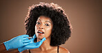 Plastic surgery, lip filler and portrait of black woman with gloves for skincare, facial implant and beauty. Dermatology, studio background and person with needle for cosmetics, anti aging and change