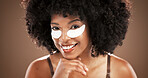 Skincare, eye mask and portrait of black woman on brown background for facial, dark circles and wellness. Dermatology, collagen and face of person for beauty, anti aging and cosmetics for health