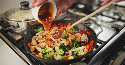 Buy stock photo Cooking, hands and chef with sauce for cuisine, flavor or mixing of dish with ingredients or dinner. Kitchen, entrepreneur and person with gravy for gourmet, meal prep and healthy food for home