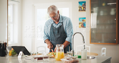 Buy stock photo Kitchen, senior or man with tablet for cooking recipe method, lunch and guide in home. Online tutorial, retirement or elderly person with blog for ingredients instruction, food or meal prep steps