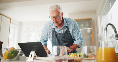 Buy stock photo Learning, senior or man with tablet for cooking recipe tutorial, lunch and guide in home. Kitchen, retirement or elderly person reading blog for ingredients instruction, food diet or meal prep steps