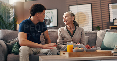 Buy stock photo Happy, patient and talk with caregiver in nursing home, medical help or conversation with old woman. Assisted living, people and chat with nurse in lounge, retirement or smile for discussion in house