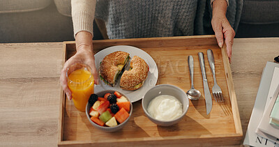 Buy stock photo Senior person, hands or breakfast with juice on tray for elderly care, hospitality or accommodation. Top view, food and salad with healthy diet, fruit or drink for meal or service at retirement home