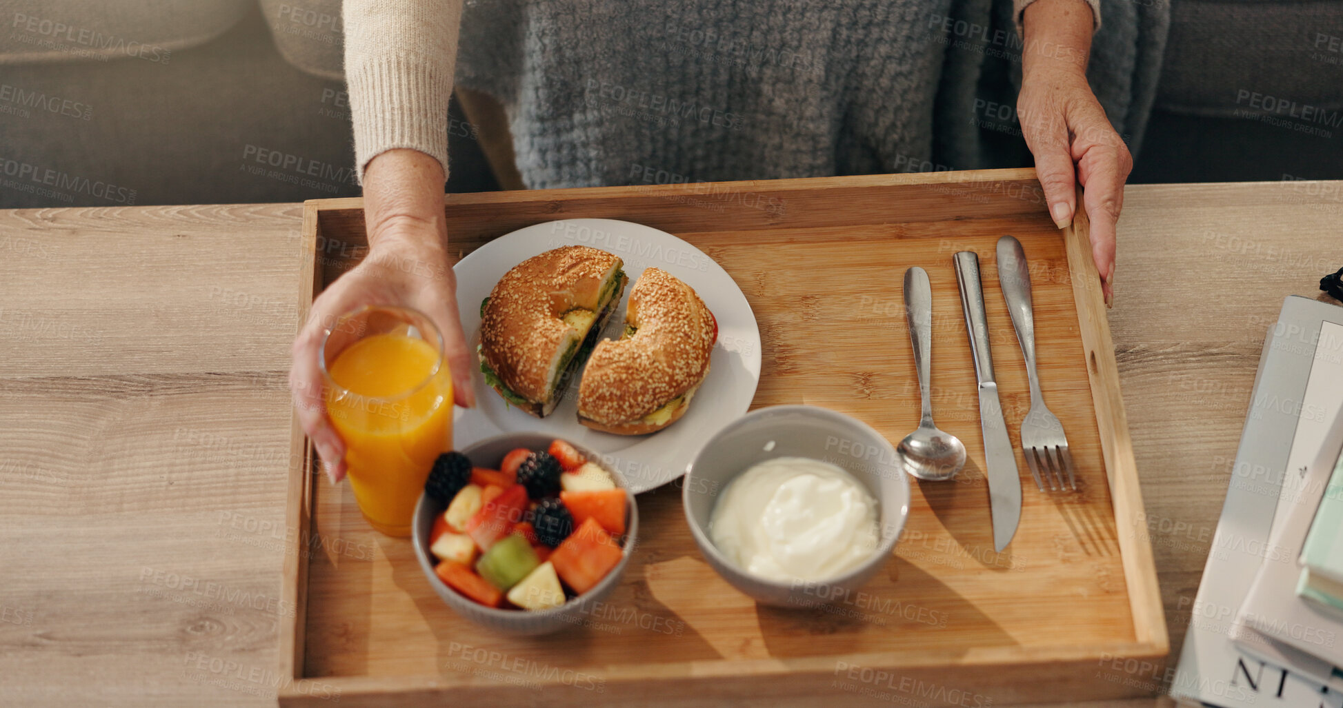Buy stock photo Senior person, hands or breakfast with juice on tray for elderly care, hospitality or accommodation. Top view, food and salad with healthy diet, fruit or drink for meal or service at retirement home