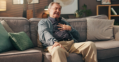 Buy stock photo Emergency, hurt and senior man with heart attack, ache or discomfort of pressure in lounge and sore. Home, panic and elderly person with chest pain of disease, heartburn and shortness of breath