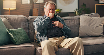 Buy stock photo Senior, sick man and couch with chest pain on sofa for cardiac arrest or bronchitis at home. Elderly, male person or patient with illness, virus or viral infection for lung disease or heart attack